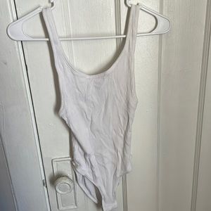 White open back body suit
